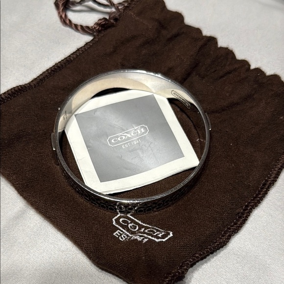 Coach Wide Silver Tone Bangle Bracelet - Picture 1 of 5
